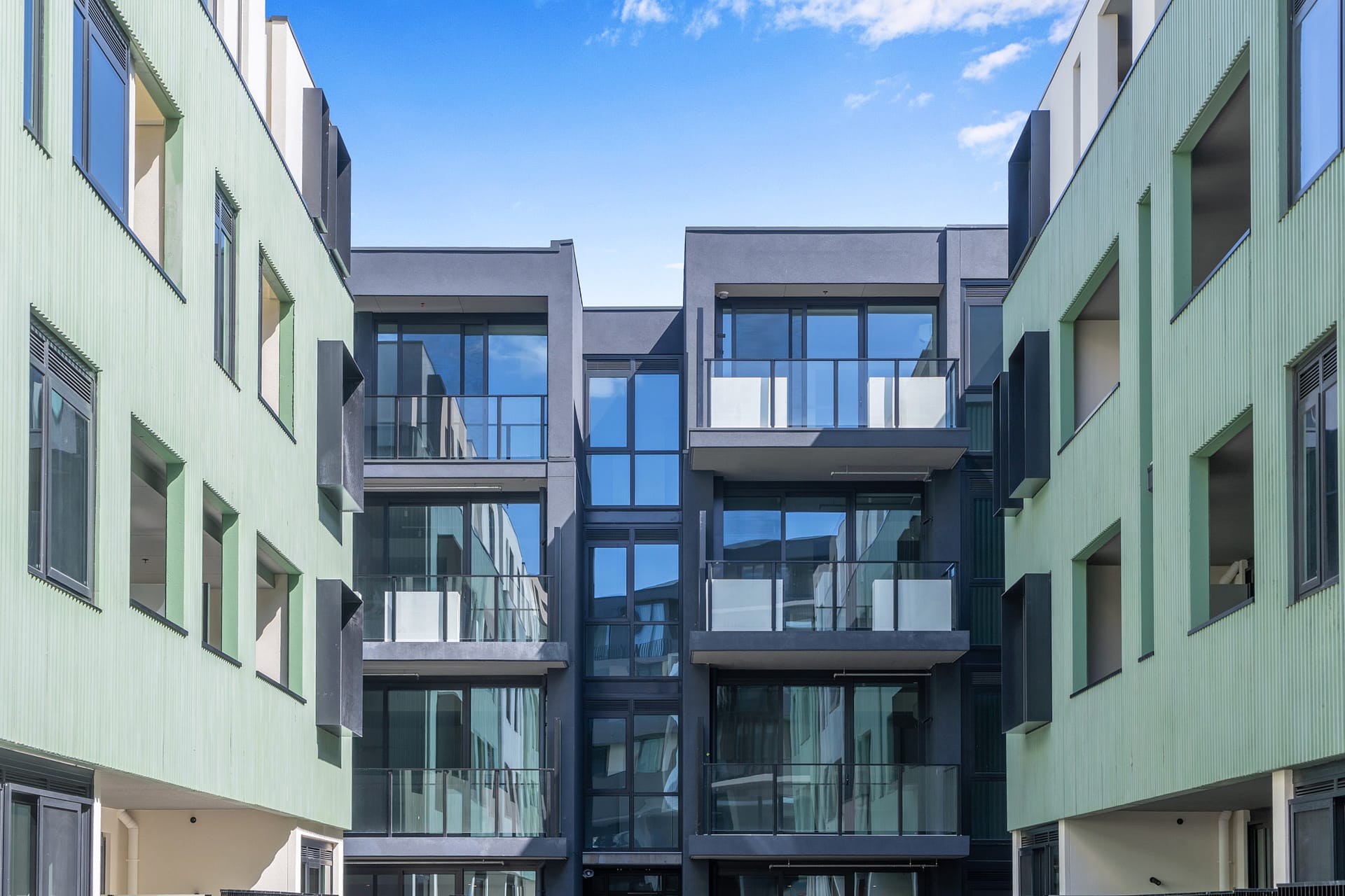 Pale green ribbed precast at Lusher Rd social housing, Croydon